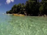 Kayaking in turquoise and clear waters. Kayaks, eau turquioise et claire. Roseharrycove,Seychelles